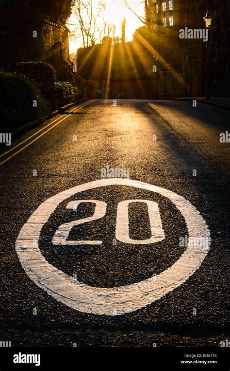 A 20 Mph Road Speed Restriction Sign Painted On Road Castle Entrance