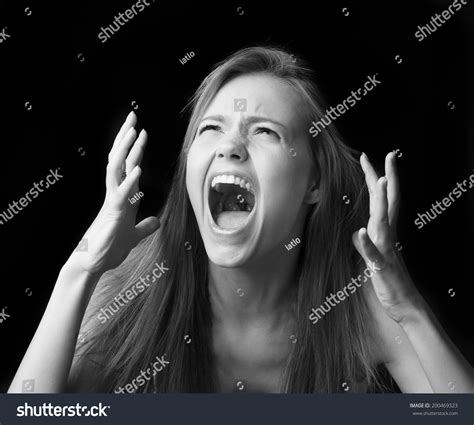 Portrait Of Screaming Girl On Black Background Stock Photo Shutterstock