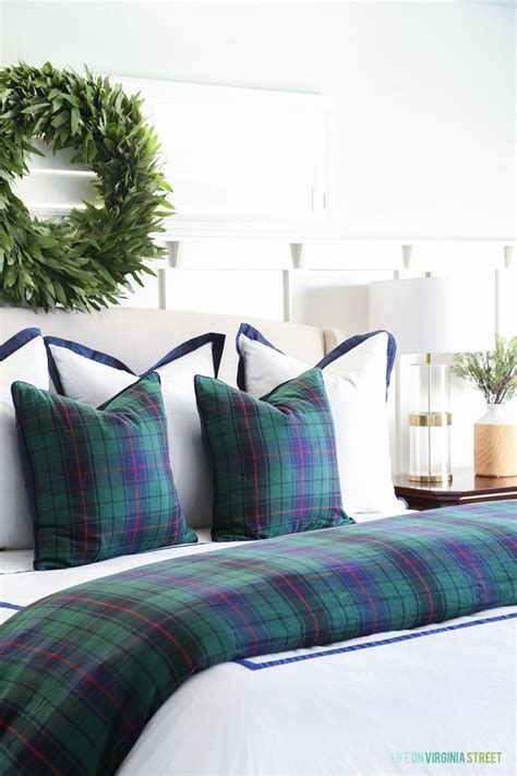 This large trendy master bedroom comes with a blue green accent wall that creates a simple yet striking statement. Christmas Home Tour: Master Bedroom and Craft Room ...