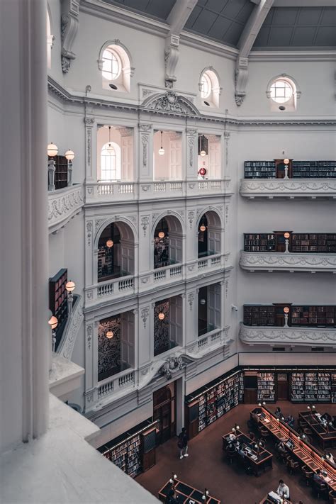 Interior Of A White Library Photo Free Human Image On Unsplash