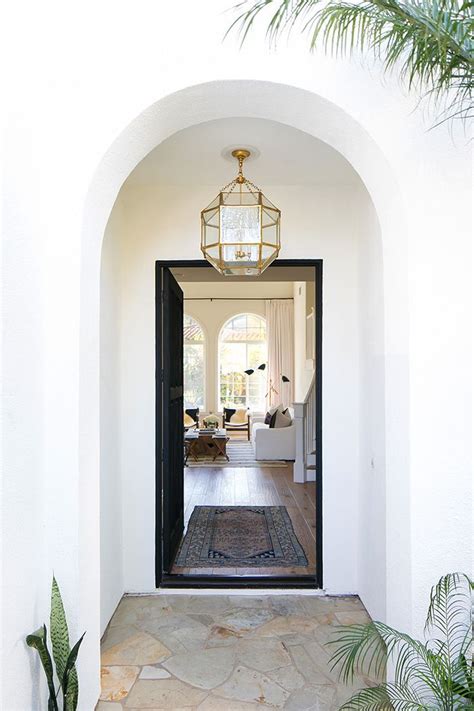 We're loving this foyer by romanek design studio. 15 Entryway Decorating Ideas That Make a Stunning First Impression