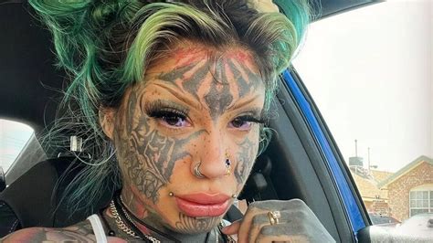 woman with face and body covered in tattoos accused of worshipping the devil mirror online