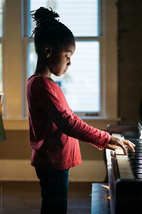 African American Girl Playing Piano By Gabriel Gabi Bucataru