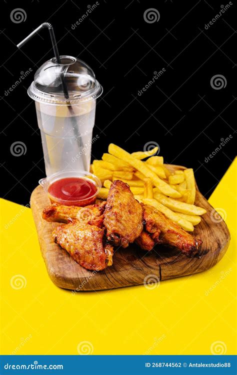 Breaded Crispy Fried Chicken Wings French Fries And Sauce Stock Photo