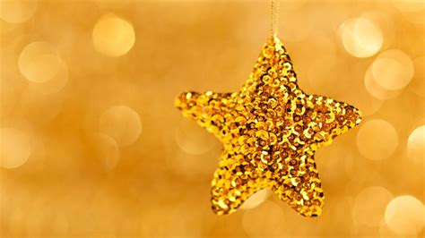 Golden Star In Yellow Bokeh Background Hd Christmas Star Wallpapers