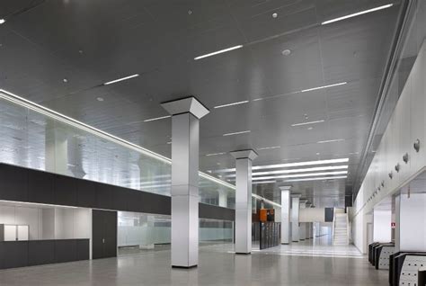 They are created using metal grid systems, which are suspended below the ceiling or roof deck using a series of wires. Suspended Ceiling Tiles | False Ceilings | Pure Office ...