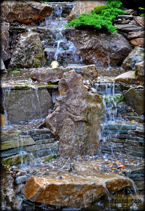 Moss Rock And Stacked Stone Waterfall Display Designed And Installed By