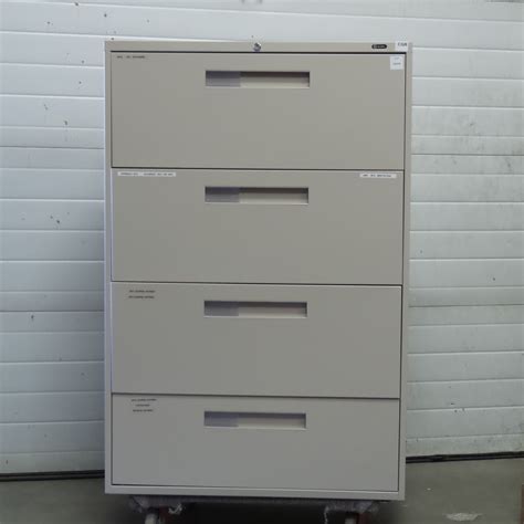 These cabinets usually contain 2 to 5 drawers and can meet the to assess the quality of the materials used in the 4 drawer lateral file cabinet, check the suspension system that supports a drawer. Global Grey 4 Drawer Lateral File Cabinet, Locking ...