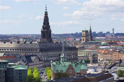 Aerial View On The City Christiansborg Palace And Distinctive Spire Of