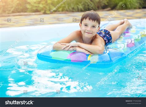 Boy On Inflatable Float Outdoor Swimming Stock Photo 1773392000