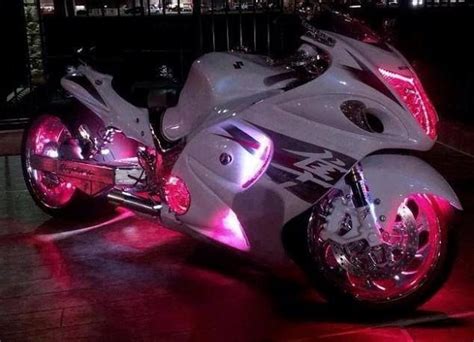 white street bike with pink under lighting pink motorcycle futuristic motorcycle suzuki