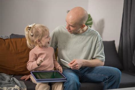 Deaf Child Girl With Cochlear Implant Studying To Hear Sounds And Have