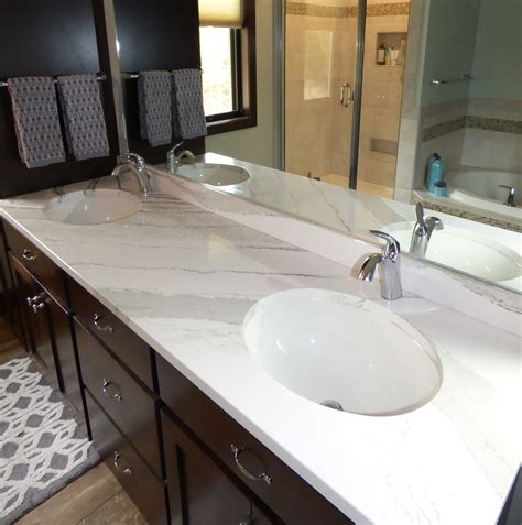 Pictures of stunning bathroom sinks, countertops and backsplashes. White Quartz Countertops - Creative Surfaces Blog