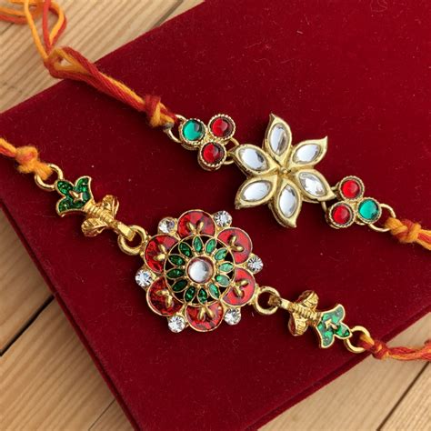 Sparkling Floral Pattern Kundan Work Rakhi Set Of 2 For Bhaiya Buy