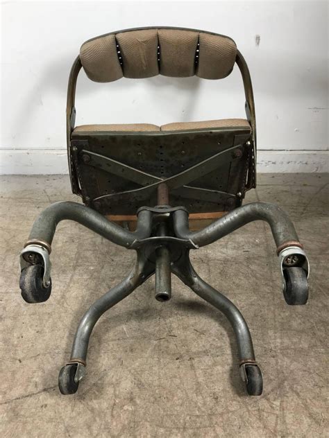 The ambiance and environment pays a great deal to our moods. Early Antique Industrial Adjustable Rolling Desk Chair by ...