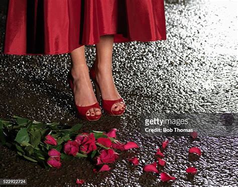 high heels rain photos and premium high res pictures getty images