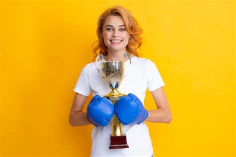 Premium Photo Woman In Boxing Gloves Hold Champion Winner Cup Trophy