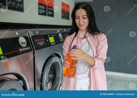 Woman In Laundromat Showing Bad Cleaning Detergent Stock Image Image