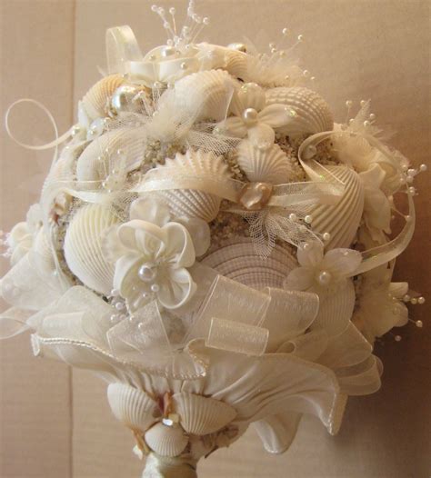 Seashell bouquets are unique alternatives to the traditional floral bouquet that will last forever and can be the perfect touch to not just beach weddings, but any summer wedding as well. WEDDING BOUQUET Seashell Bouquet Beach Wedding | Sea ...