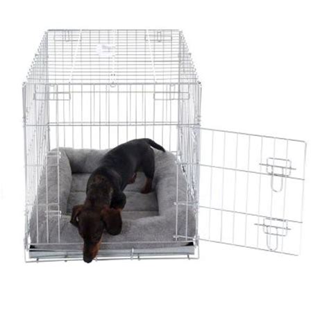 With the snuggle puppy, my actual puppy didn't make a peep! Snuggle Cushion for Dog Carriers & Crates | Free P&P £29+
