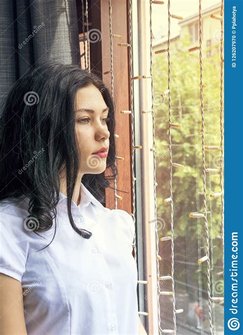 Brooding Girl Posing Inside Near Window Stock Photo Image Of Dreamer