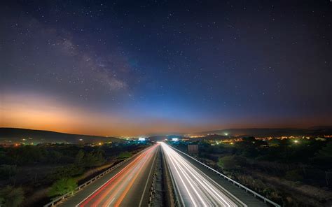 Time Lapse Photo Of Vehicle On Road At Night Time Long Exposure Road