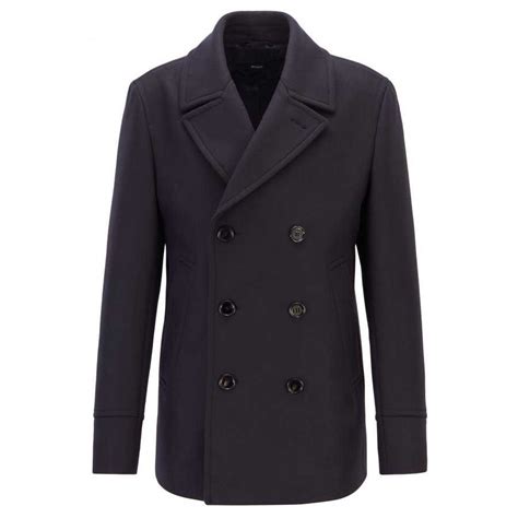 De coupe ajustée, ce modèle à double boutonnage en pure laine est doté de. Caban bleu marine | Boss Black | 100% Laine Melangée ...