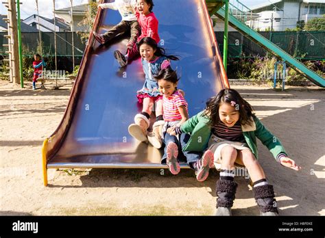 Japan School Playground Children Three Girls 6 8 Years Old Jumping