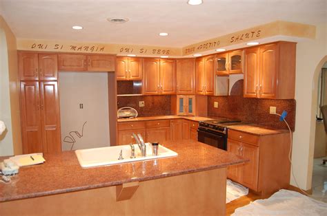 Instead of replacing them, consider refacing cabinets. Minimize Costs by Doing Kitchen Cabinet Refacing ...
