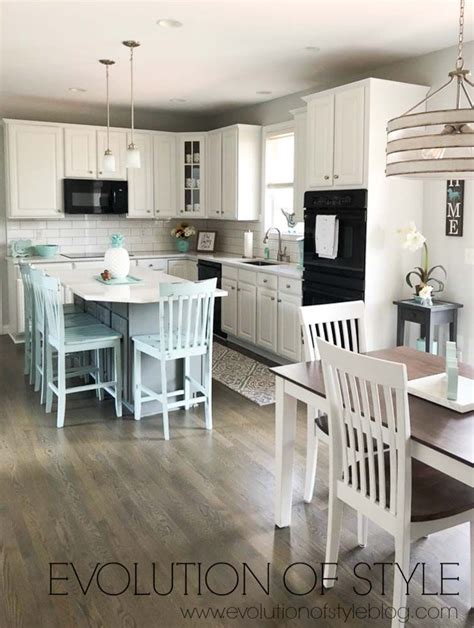 Now a days, white isn't just plain and boring white. Painted Kitchen Cabinets in Sherwin Williams' Pure White ...