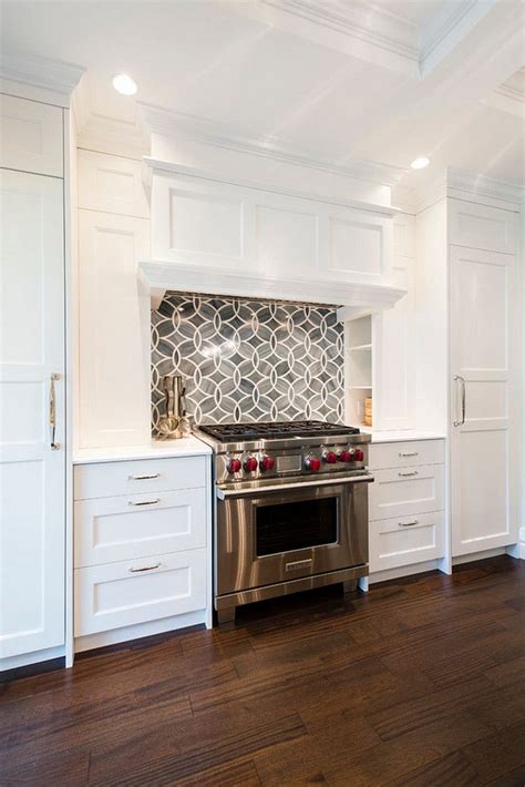 Jan 05, 2018 · gray kitchen cabinets are a great compromise between lively, bright white kitchen cabinets and dark, mysterious black kitchen cabinets. White Kitchen with Blue Gray Backsplash Tile - Home Bunch ...