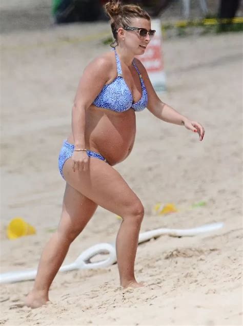 Coleen Rooney Shows Off Her Growing Baby Bump In A Skimpy Blue Bikini Daily Record