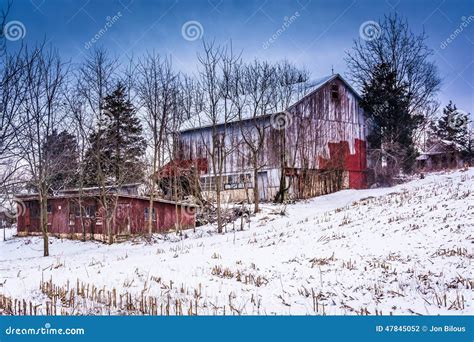 Old Barn And A Snow Covered Field In Rural York County Pennsylvania