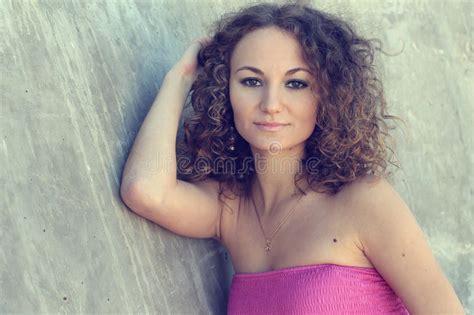 fashionable curly brunette model posing stock image image of elegance brunette 27257345