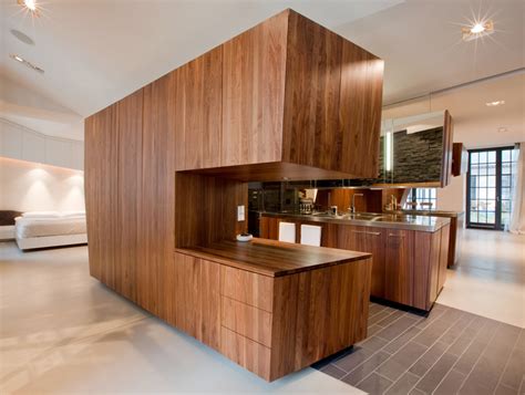 Modern Loft With A Freestanding Centralized Wood Veneer Kitchen Digsdigs