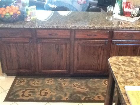 Without kitchen, a house wouldn't be called a home. Oak cabinets finished in Minwax red mahogany stain ...