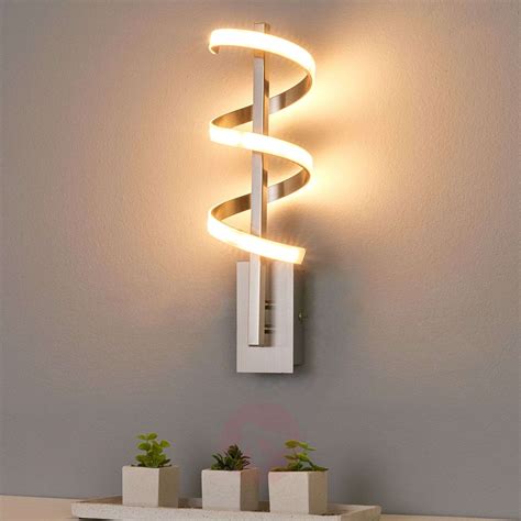 Shop warm dim what is warm dim. Twisted LED wall light Pierre | Lights.co.uk