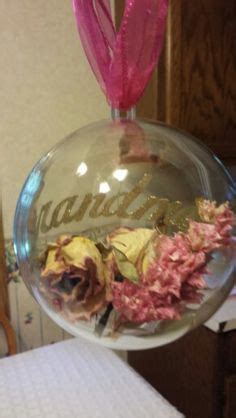 Creative holiday ideas for grandma and grandpa. Flowers and ribbon from my grandmothers funeral. Made into ...