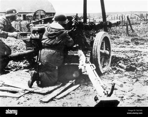 Soldiers With An Anti Tank Gun At The Eastern Front Expecting A Soviet