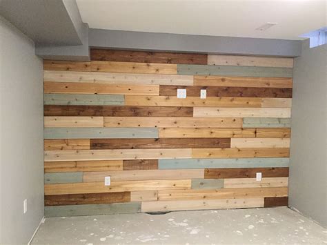 Basement Wall Finished With Cedar Boards And Different Finishes