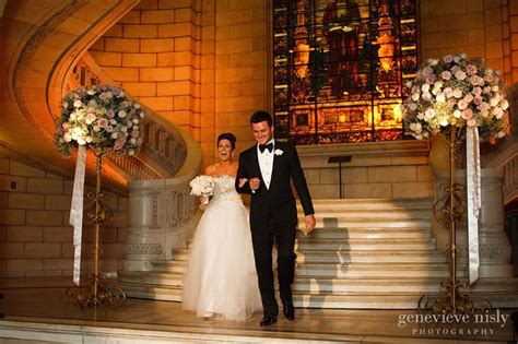 The Happy Couple Flanked By A Magnificent Pair Of Flower Balls On Gold