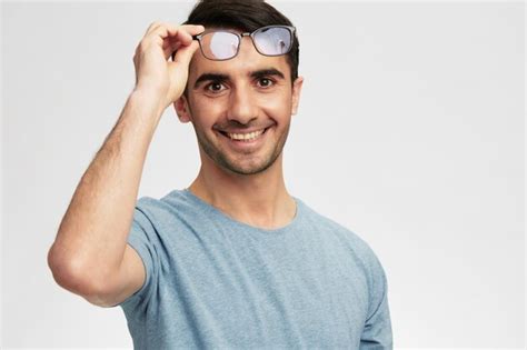 Premium Photo Handsome Man Blue Glasses Casual Wear Posing Emotions Isolated Background