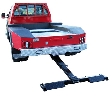 Sometimes wiring and other components need to be lengthened to accommodate the larger gap between the body and the frame. lift-tow-truck-5series2