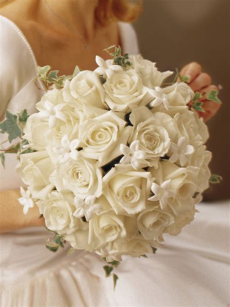 The main feature of these gorgeous bridal and bridesmaids bouquet is the stunning dahlia in white! Graceful Rose & Stephanotis Scented Bridal Bouquet