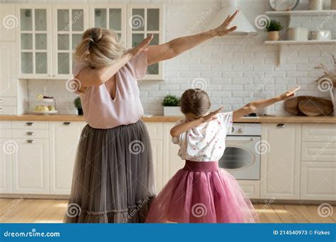 Modern Grandmother Dab Dancing With Small Granddaughter Stock Image Image Of Candid Home