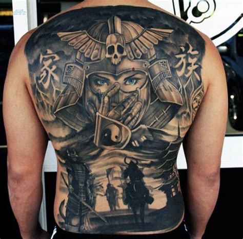 This butter flower is a good option for butterfly tattoos on the back. 120 Full Back Tattoos For Men - Masculine Ink Designs