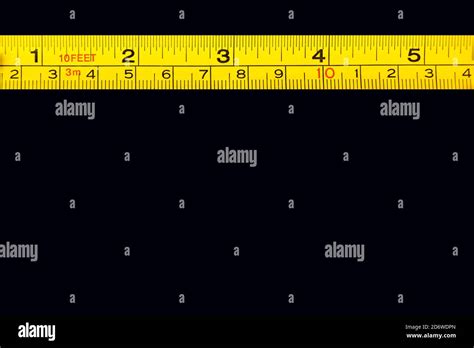 Tape Measure Centimeters And Millimeters On The Yellow Ruler Sizes And