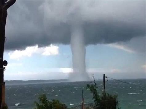 Huge waterspout forms off coast of southern italy. Australia Tornado:Giant Twister at New South Wales beach ...