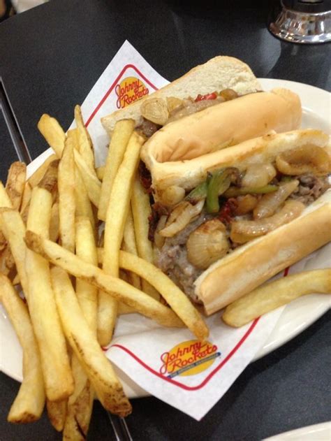 If you are going to cut it that thin and seer it that dark, wouldn't you rather use a cheaper cut of beef? Philly Cheese Steak and Fries - Johnny Rockets | Philly ...