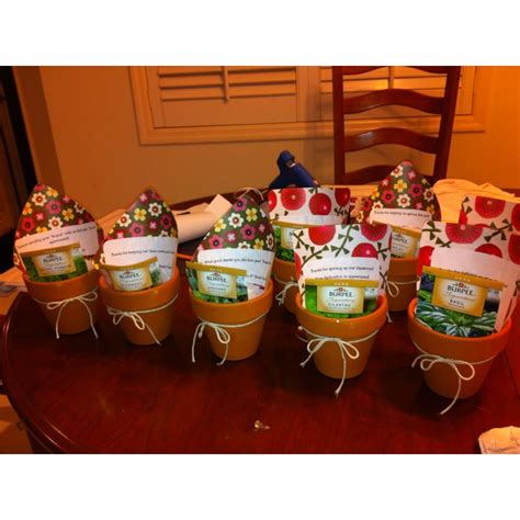 It is possible to grow houseplants indoors. Volunteer gifts: terracotta pots with herb seed packets ...